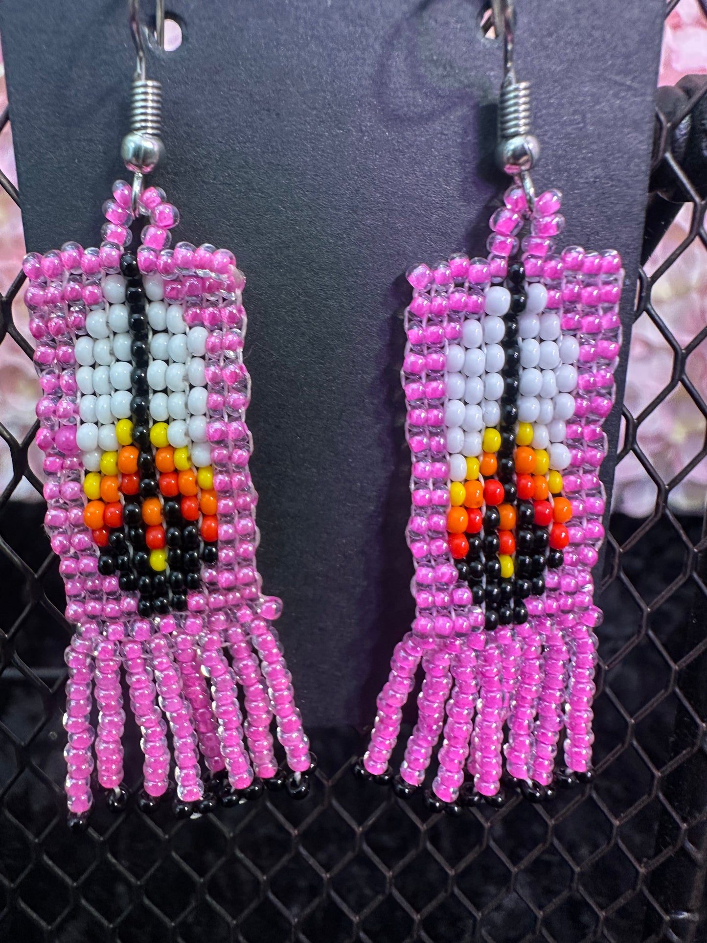Pink feather beaded earrings