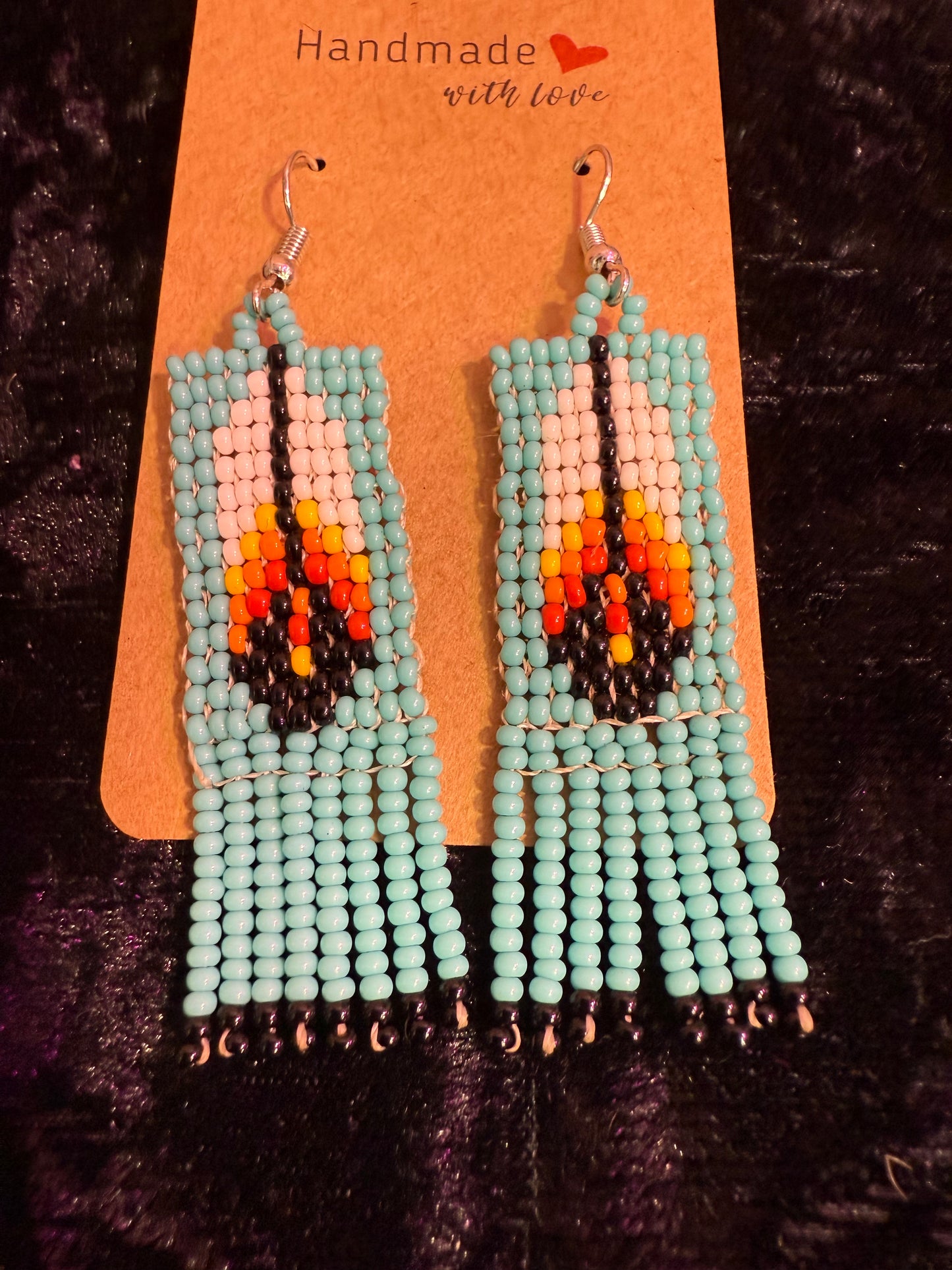 Blue feather beaded earrings