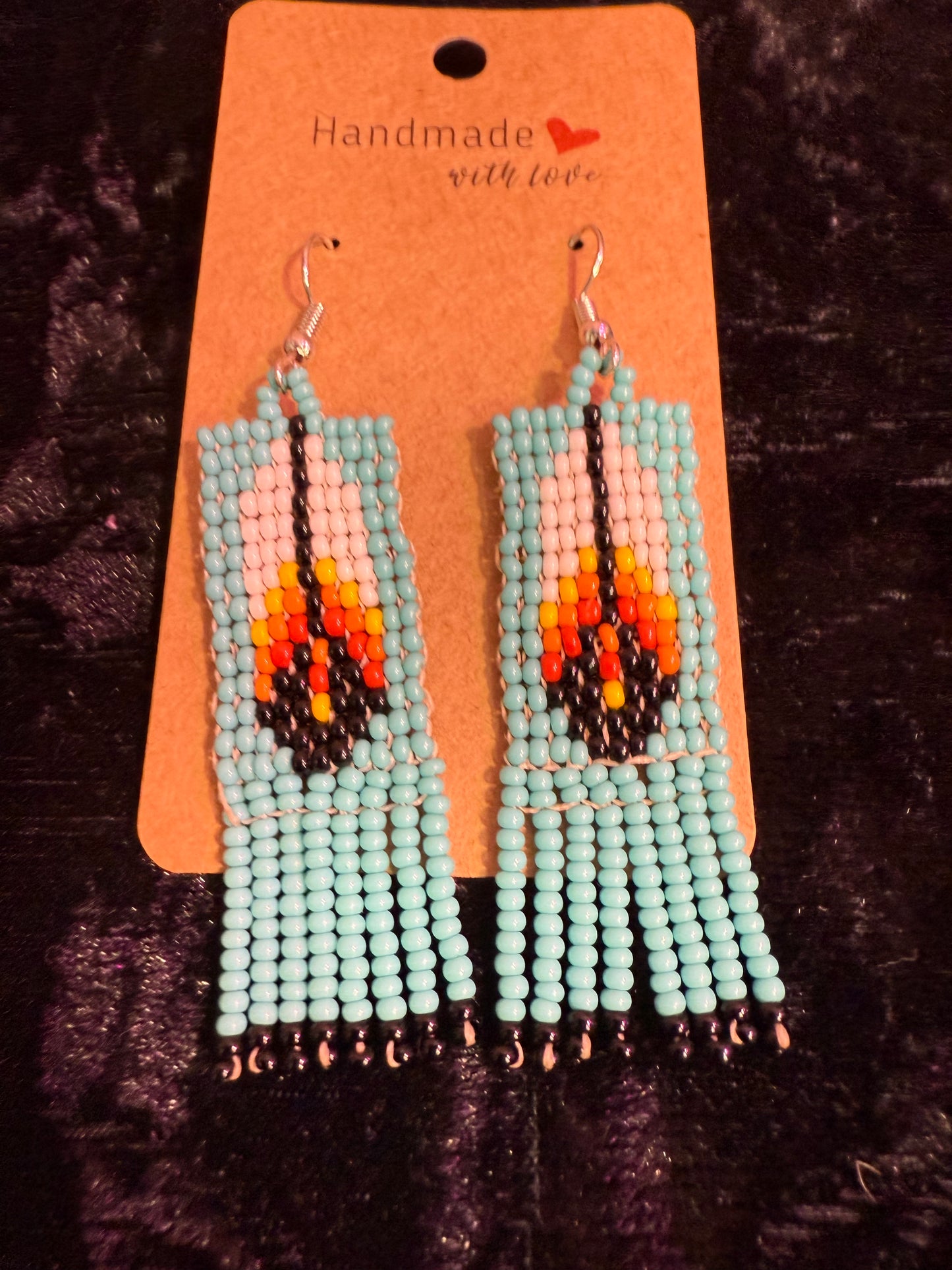 Blue feather beaded earrings