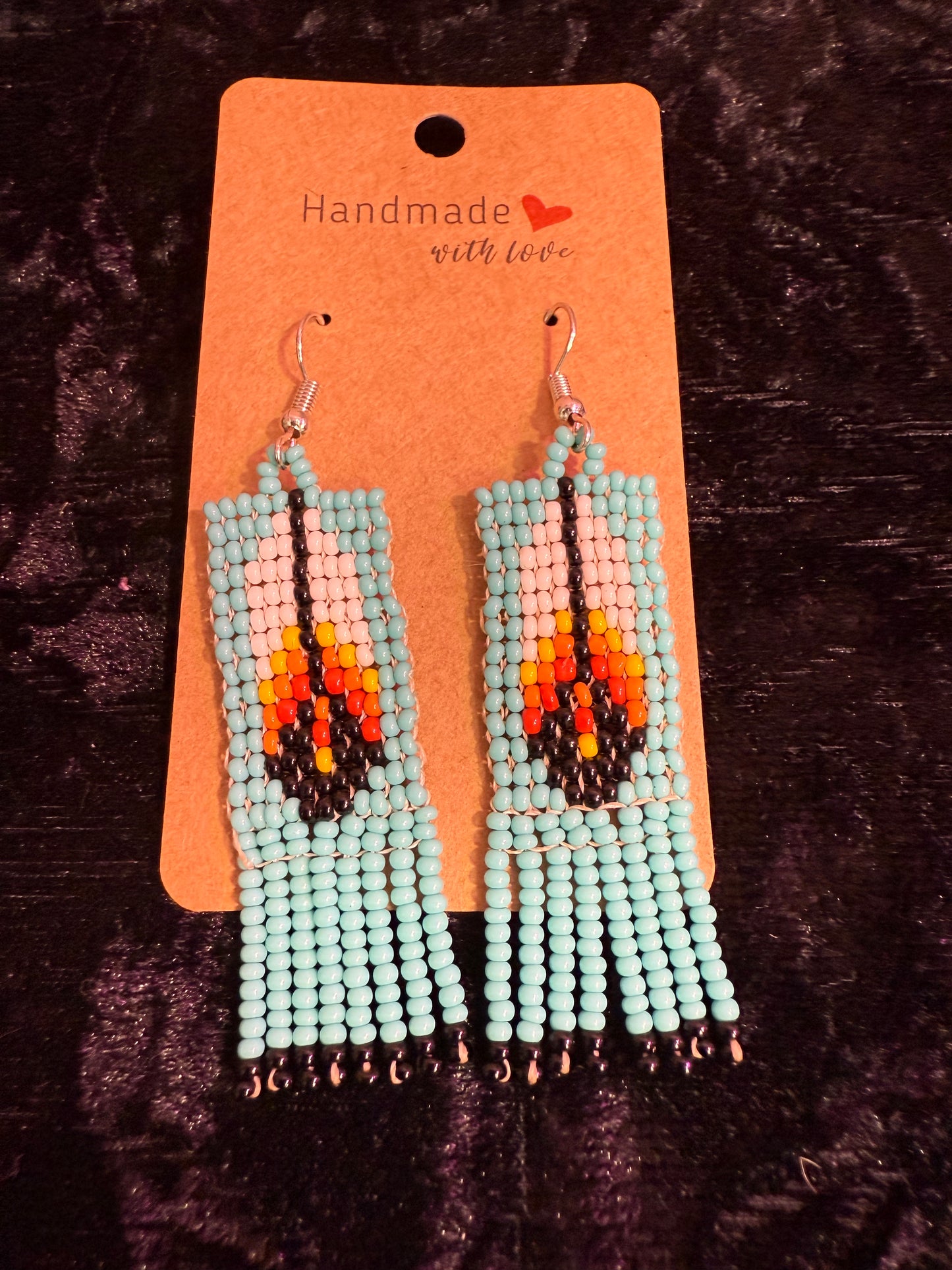 Blue feather beaded earrings