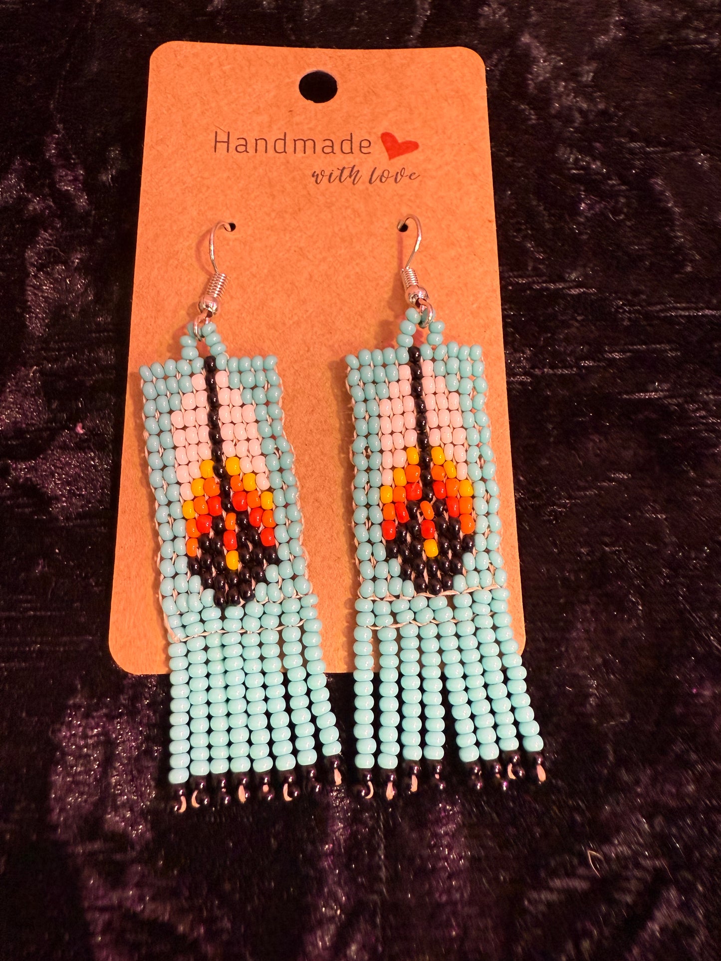 Blue feather beaded earrings
