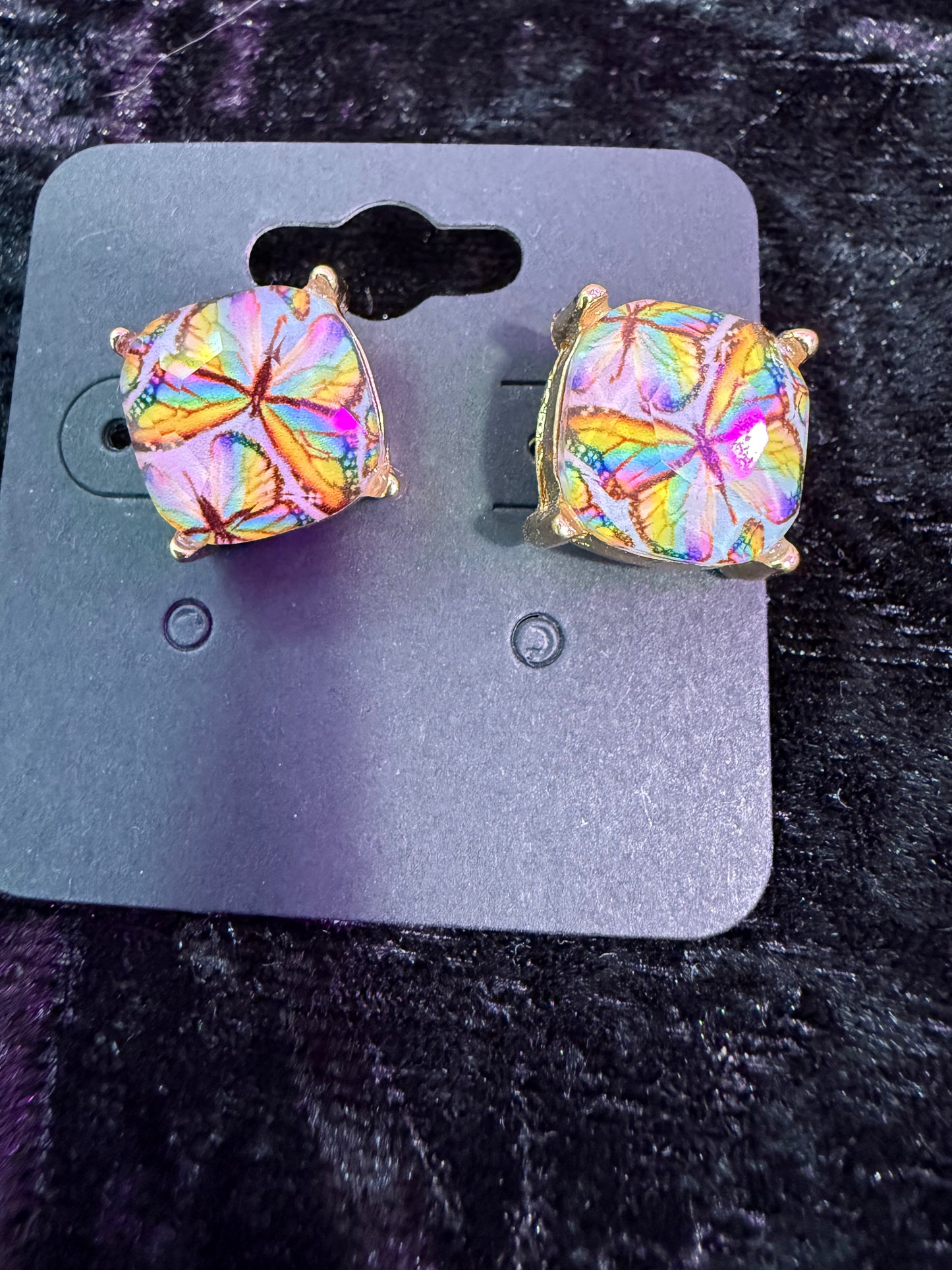 Pink swirl butterfly stud earrings