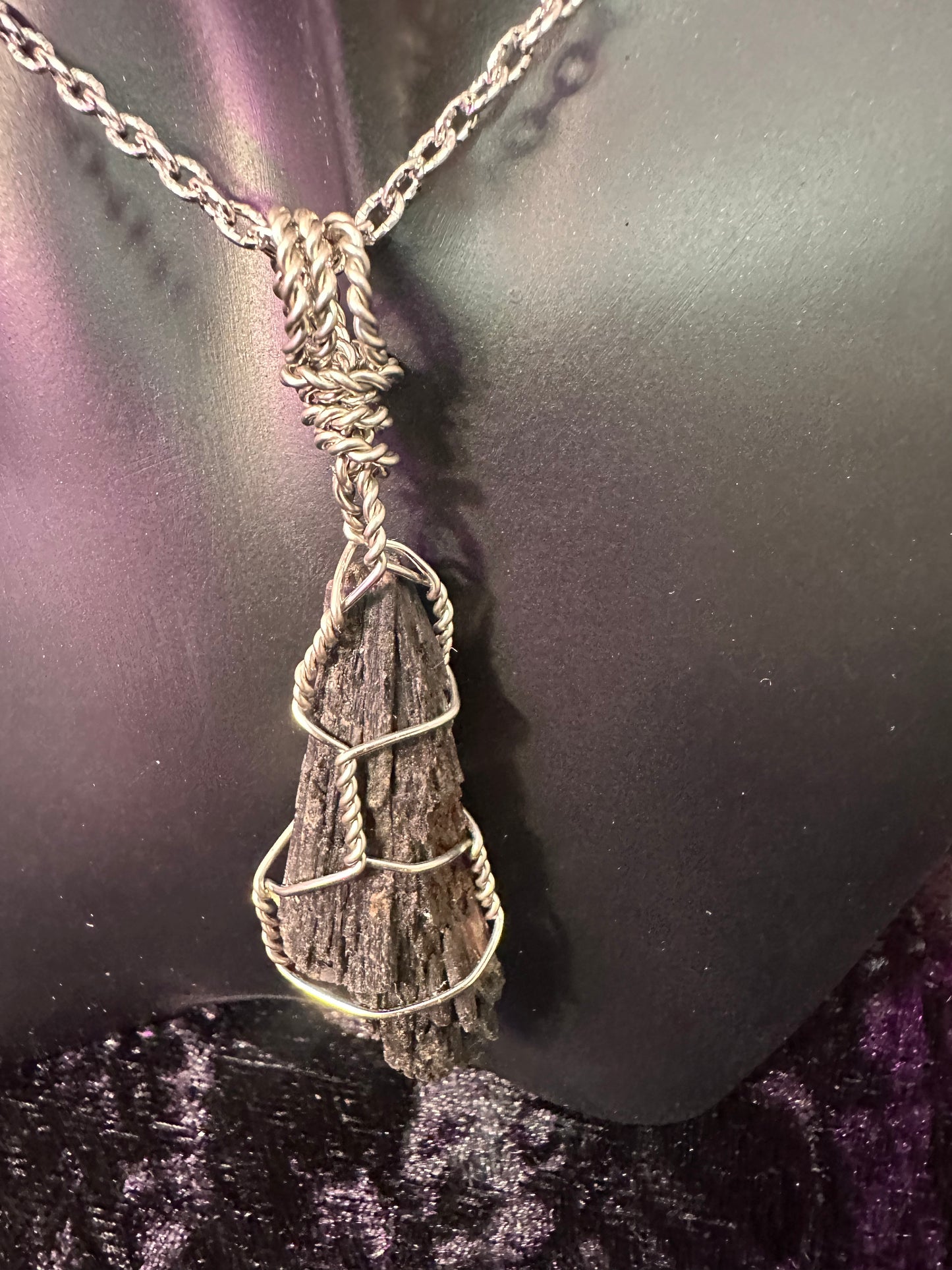 Black kyanite hand wrapped Crystal pendant