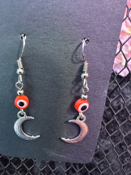 Evil eye crescent moon bead earrings red