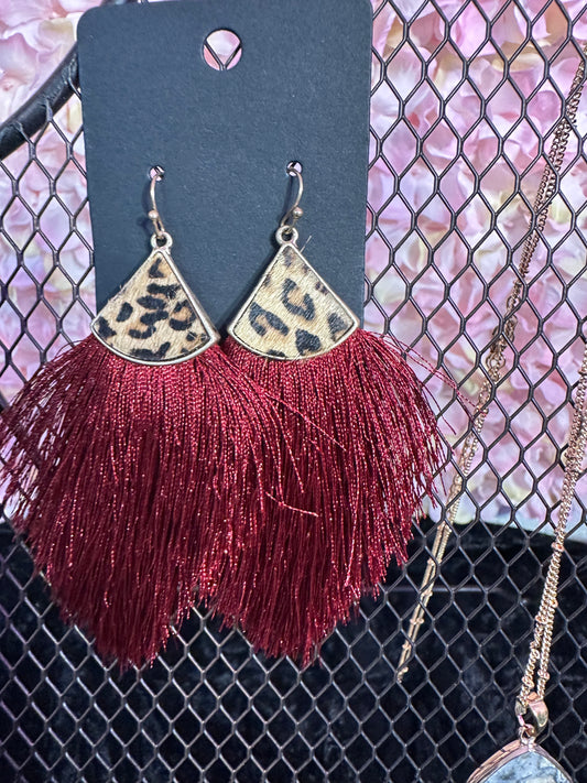 Red animal print fringe earrings