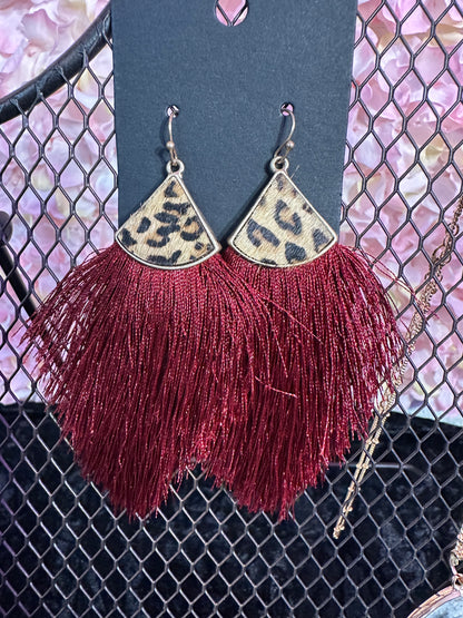 Red animal print fringe earrings