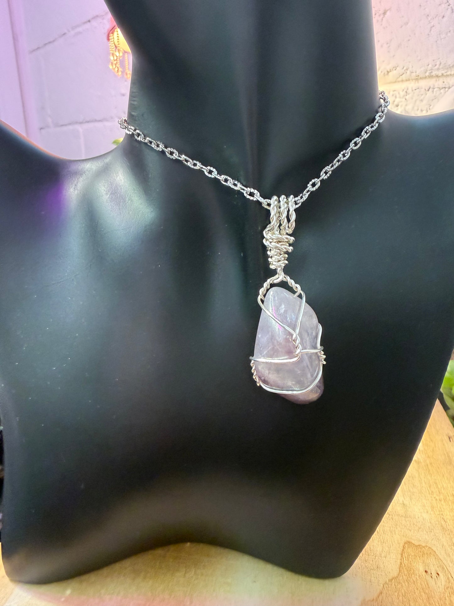 Titanium Aura amethyst pendant